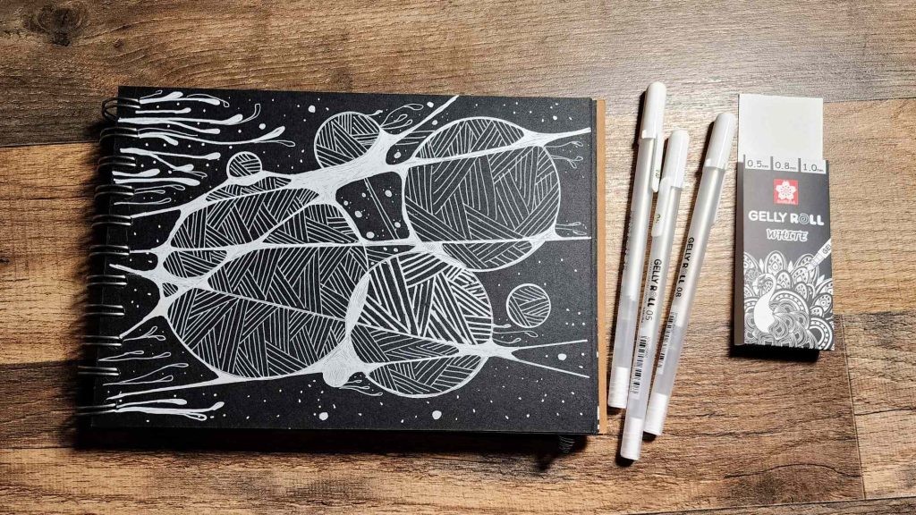 doodle with white gel pen on black paper